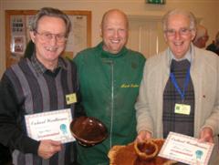 Geoff Hunt and Denis Ireland get commended certificates from Mark Baker